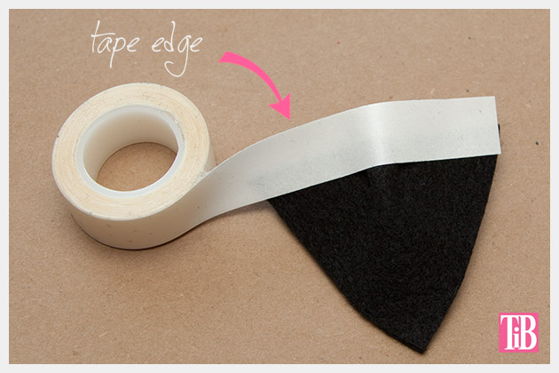 DIY Cat Beanie taping edge of ear