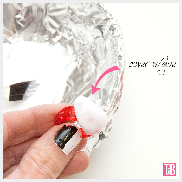 Adding glue to your Valentine Heart Rings DIY